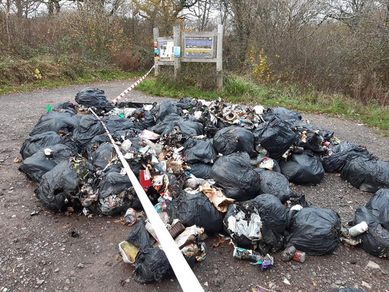 Fly-tipping at Powerstock Common nature reserve. Photo by Lucy Ferris