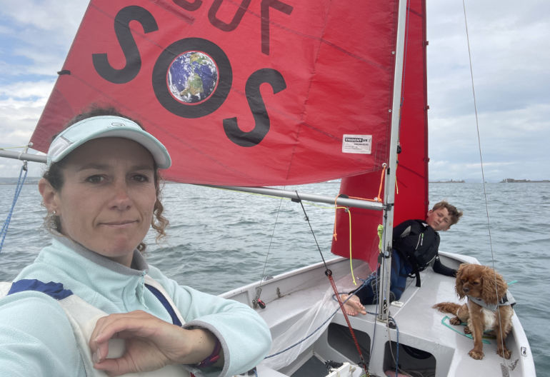 British Olympic sailor and coach Laura Baldwin with her son