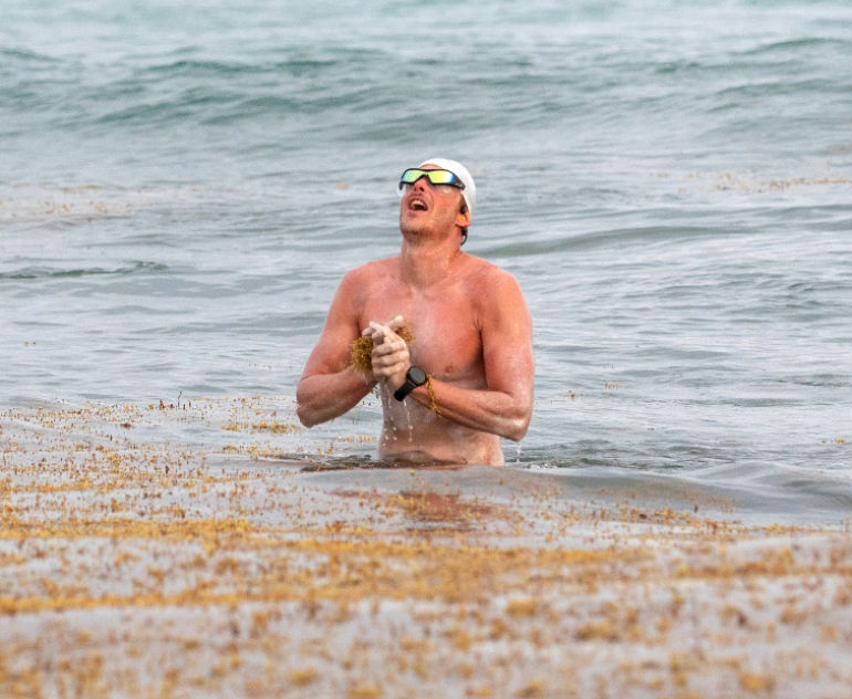 First man in history to swim non-stop around Grand Cayman: Oly Rush © Maggie Jackson