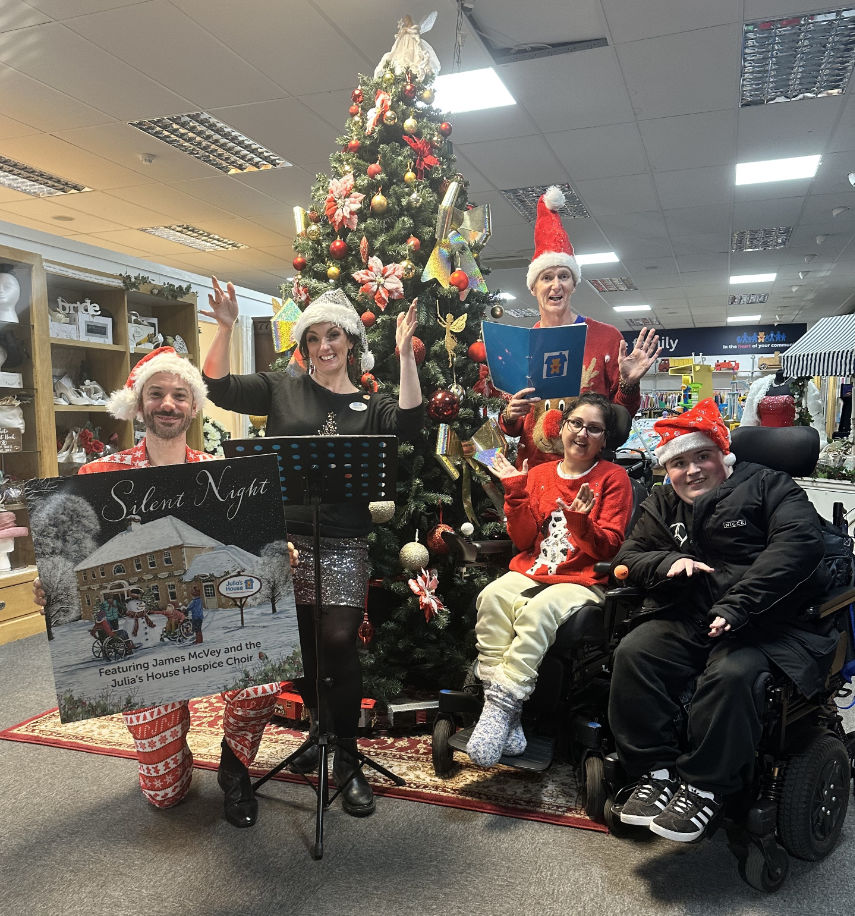 Julia's House Choir members from L-R David Hutchings, Clairelouise Moore and Martin Edwards with Ebony and Josh, Julia's House Ambassadors