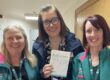Community nurses at Forest Holme with copies of the ‘Reflections from the Pandemic’ booklet