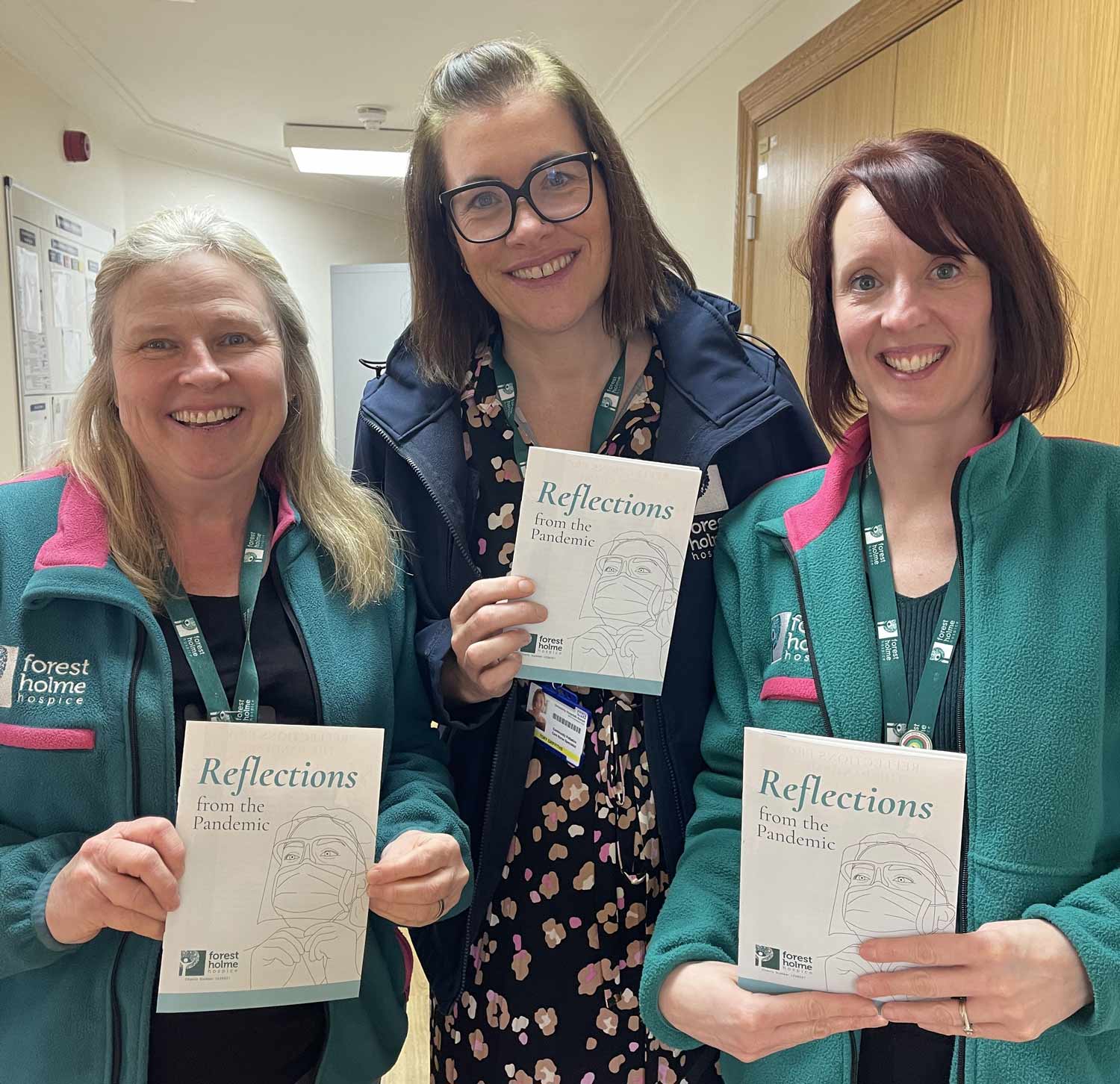Community nurses at Forest Holme with copies of the ‘Reflections from the Pandemic’ booklet