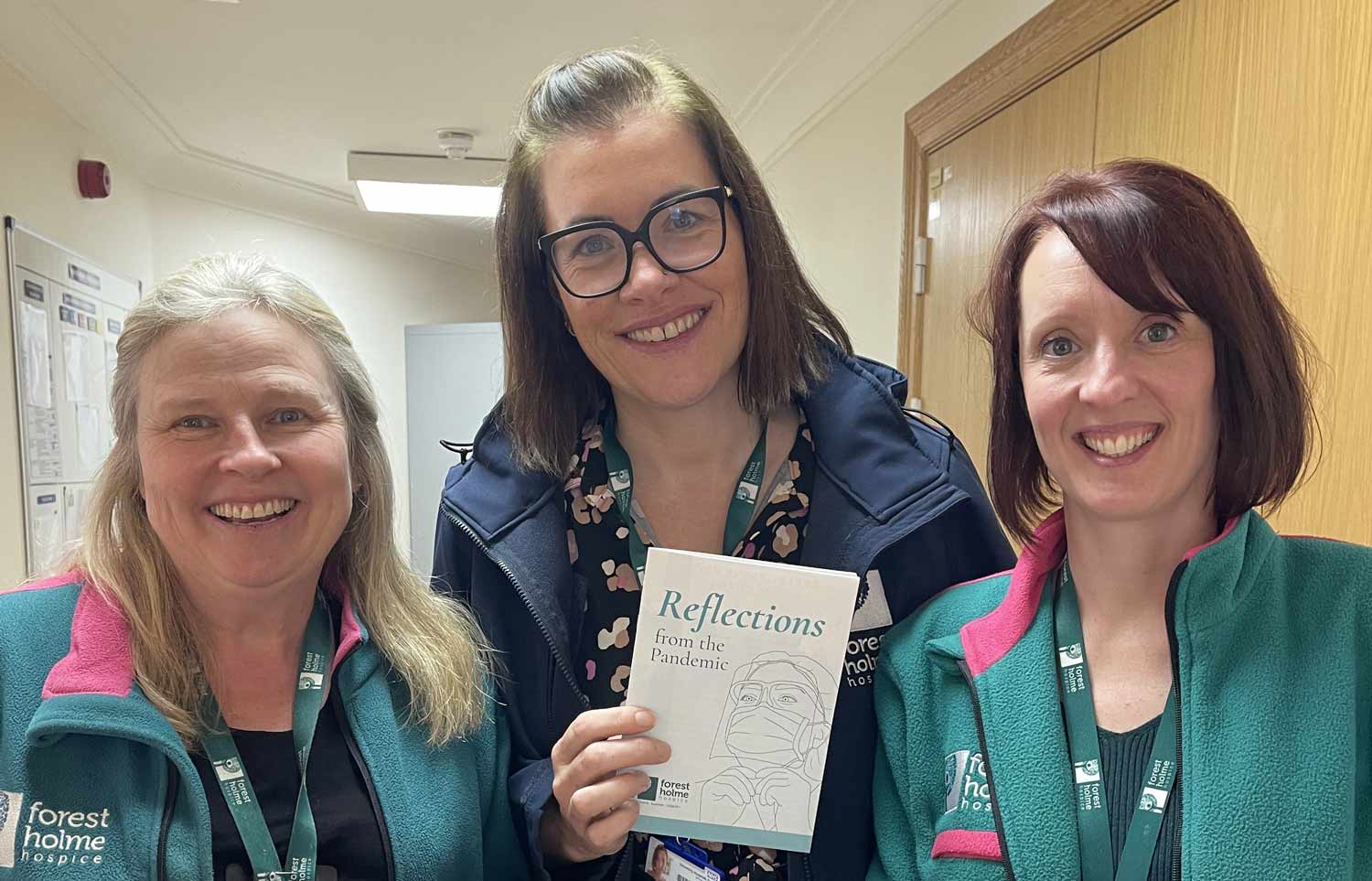 Community nurses at Forest Holme with copies of the ‘Reflections from the Pandemic’ booklet