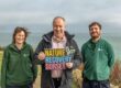 Dorset Council leader, Cllr Nick Ireland (centre), meets rangers at Durlston Country Park, Swanage