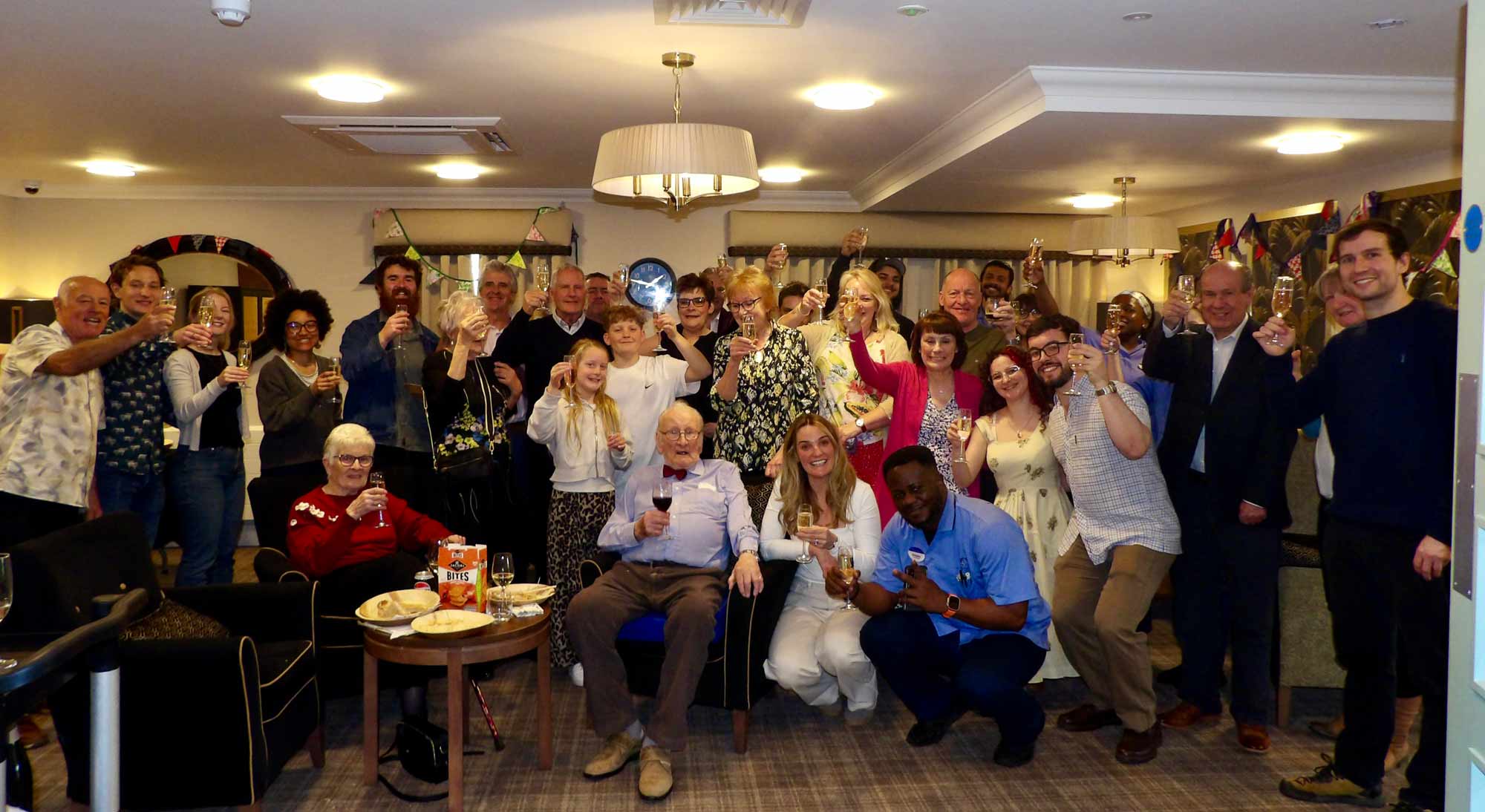 Alan with his family and the Heathland House team