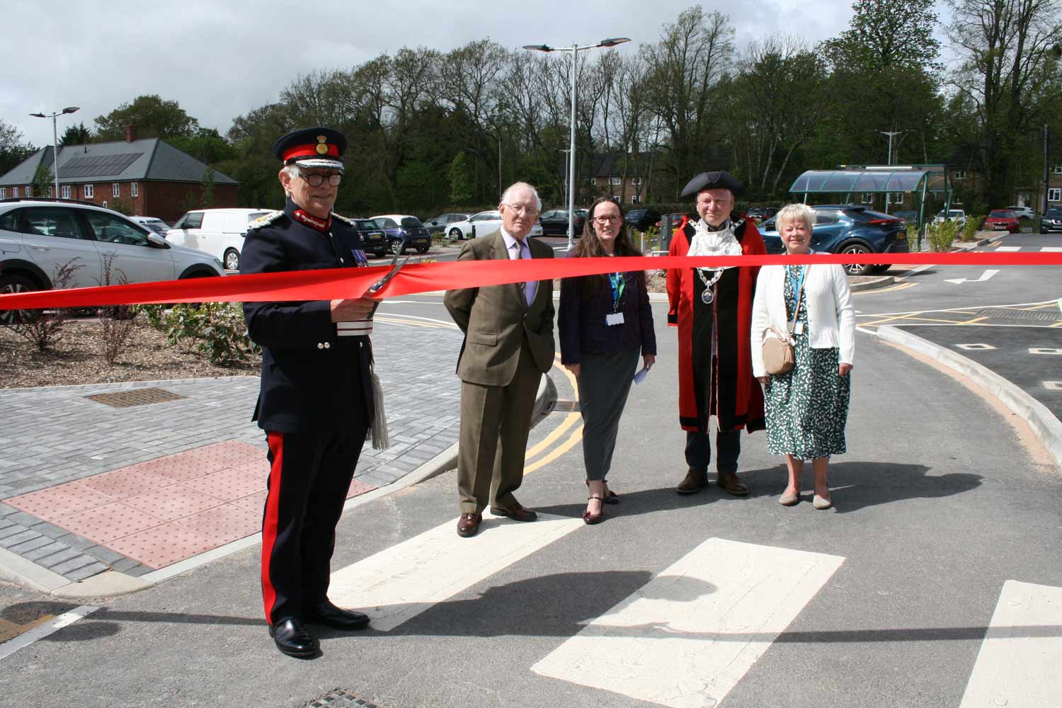 L–R: The Lord Lieutenant of Dorset, Michael Dooley, cuts the ribbon, with Dr David Pope, president of The Friends, Nicky Rowland, Dorset HealthCare and Dorset County Hospital non-executive director, Cllr Jeff Hart and Anne Salter.