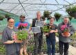 Chestnut Manager Andy Verreck (centre) with team members