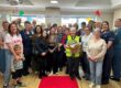 Nurse Carmel enjoying a send off from Forest Holme Hospice colleagues