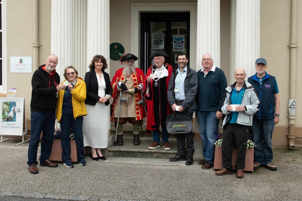 L-R: Malcolm Angel (Radio Wimborne), Linda Bunting, Sarah Evans, Cllr Chris Brown , Mayor Cllr Jeff Hart, Simon Barfoot, Ian Bagley (Repair Cafe), Neil Smith (Planet Wimborne trustee) and Glen Fowler (Radio Wimborne)