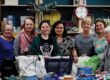 A community blanket session at The Power House Hub. L-R: Jacqui Hagans, Sonata Marcinkeviciene, Rachael Frosdick, Heather Borg-Fowley, Tracy Jones, Alix Rusling (TPH project manager and co-founder) and Pauline Atkinson