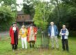 L-R: Mayor of Wimborne Minster Cllr Jeff Hart, Linda Bunting (chairperson, Planet Wimborne), Town Crier Cllr Chris Brown, Cllr Bill Richmond, Neil Smith (trustee, Planet Wimborne) with the ginkgo tree planted on Willow Walk