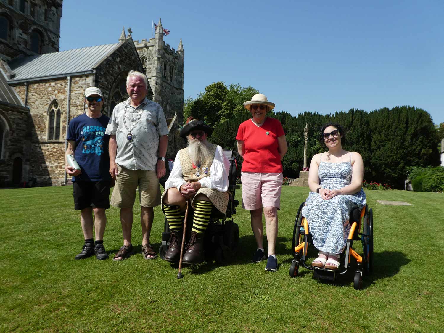 L-R: Dr Neil Smith, Planet Wimborne Trustee, Mayor of Wimborne Minster Cllr Jeff Hart, Cllr Chris Brown, town crier, Linda Bunting, Wimborne War on Waste trustee and Jordan Hilton, a local resident