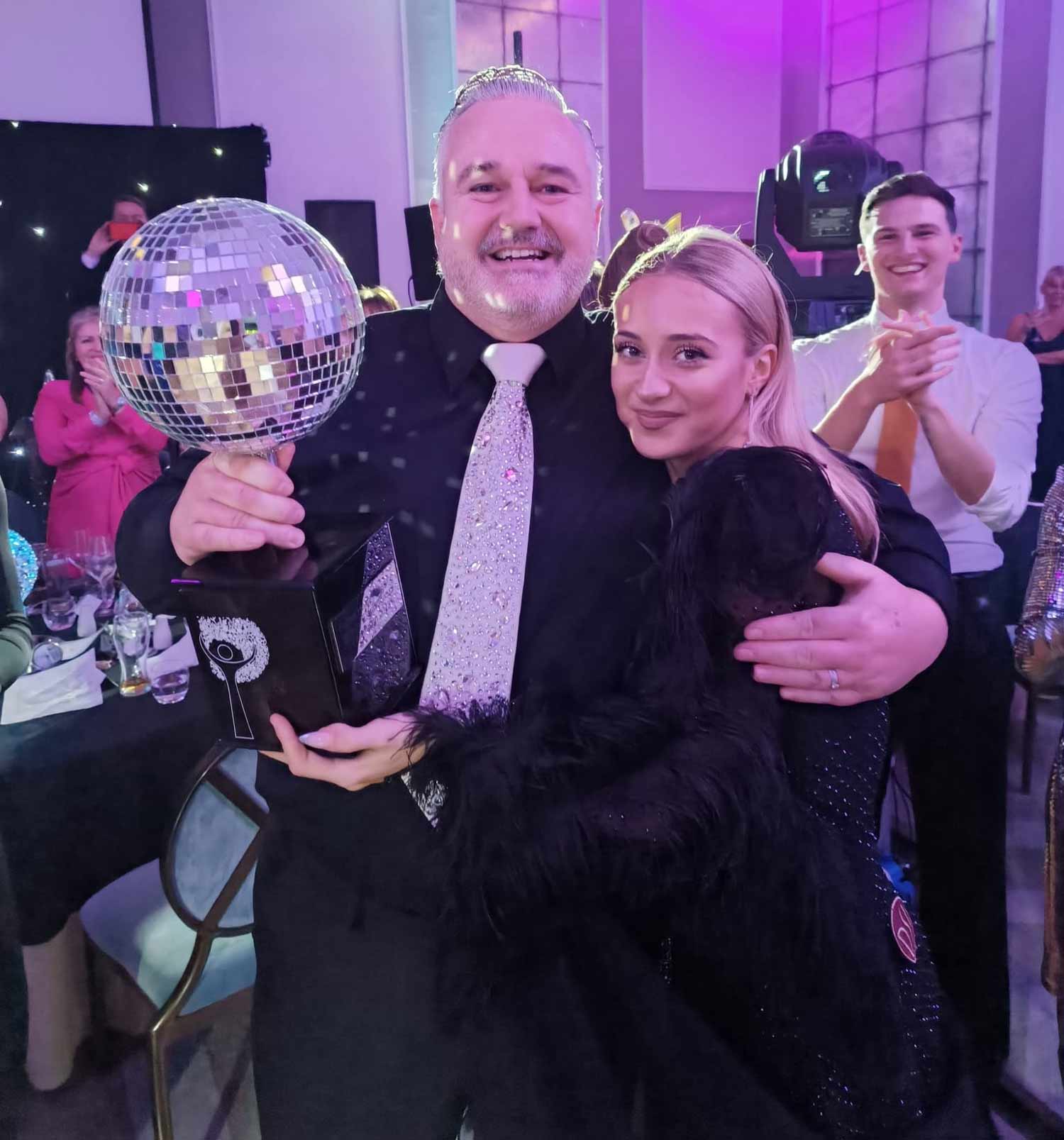 Maddie Ingoldsby with Forest Holme Hospice Charity's first Strictly Extravaganza winner Jason Edwards in 2023