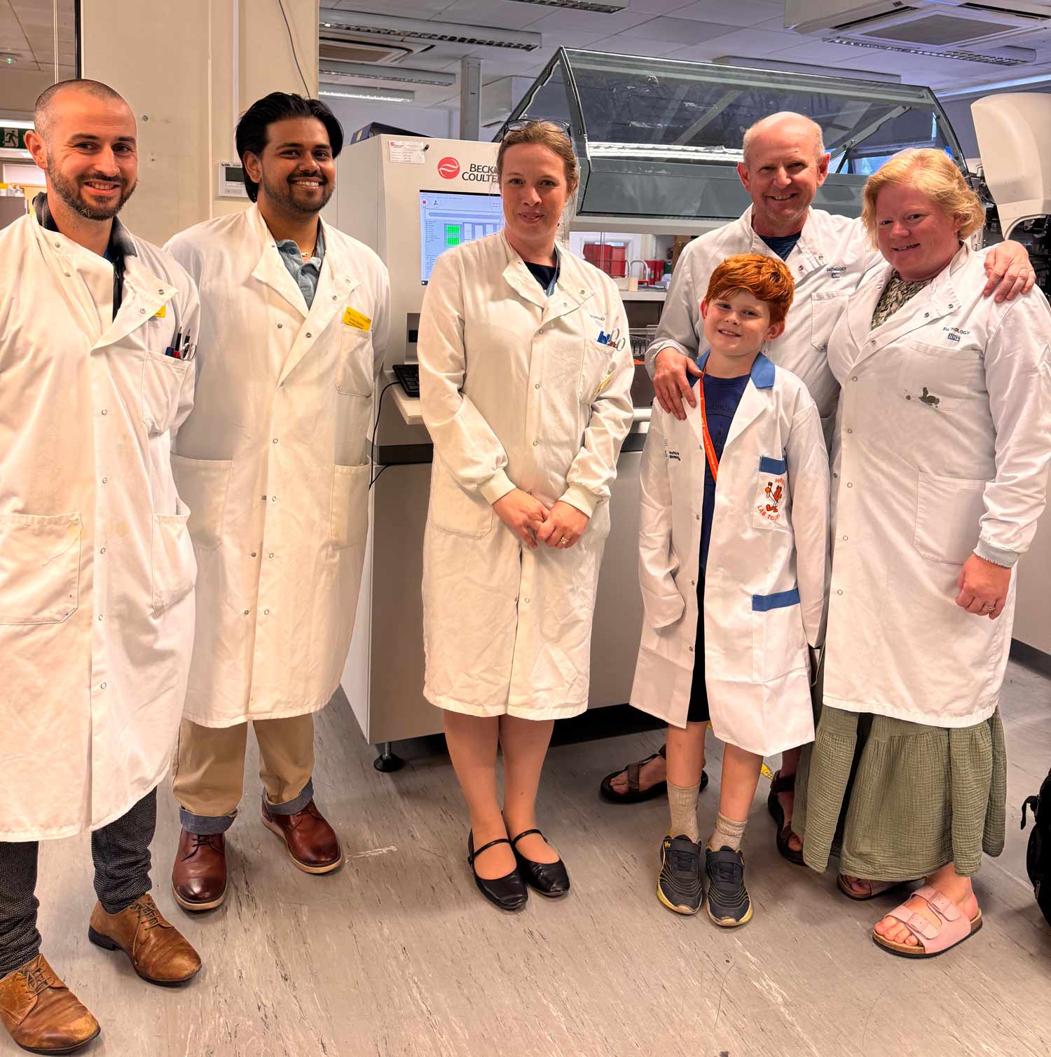 Ollie with staff in the Pathology Department