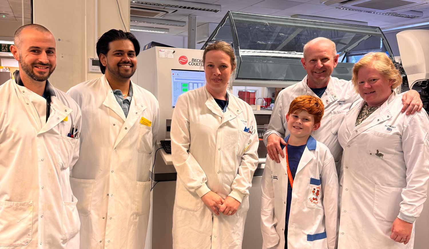 Ollie with staff in the Pathology Department