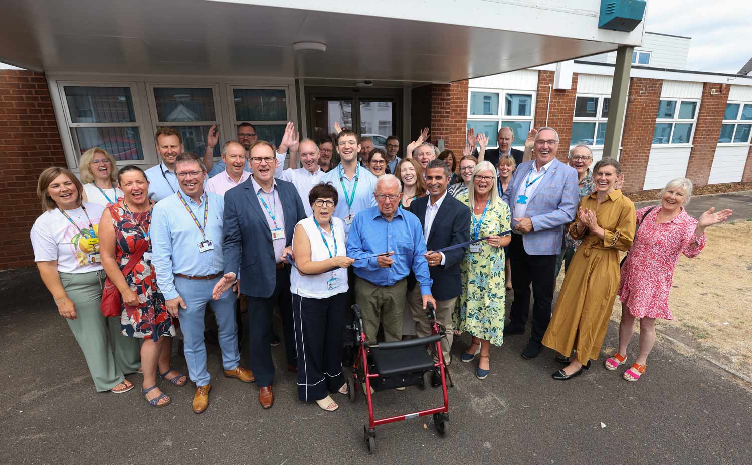 Patient Gordon Rock cuts the ribbon and Winton Health Centre