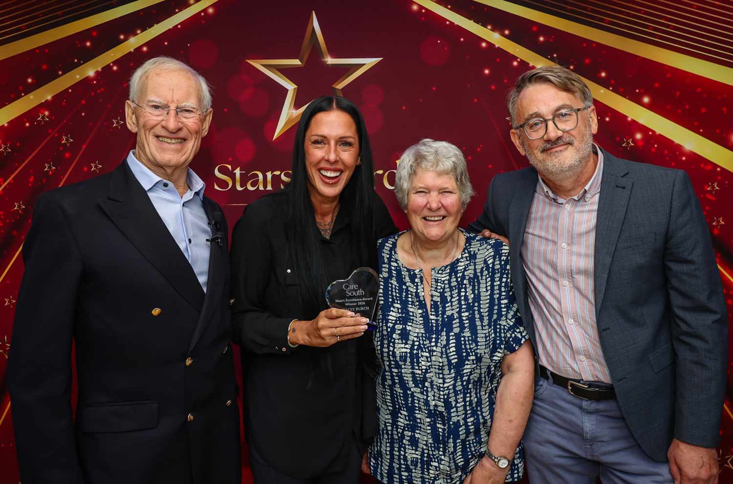 Stacey Burch pictured with Carole Knight, Chris Kean (far-left) and Martin Ross (Far-right)