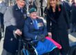 L-R Royston Wright and Chris Brogan with BBC’s Sophie Raworth at the Cenotaph 2025